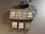 Polycom Quad Charger Pcq1850 With Batteries.. Fixed Price $40.00.